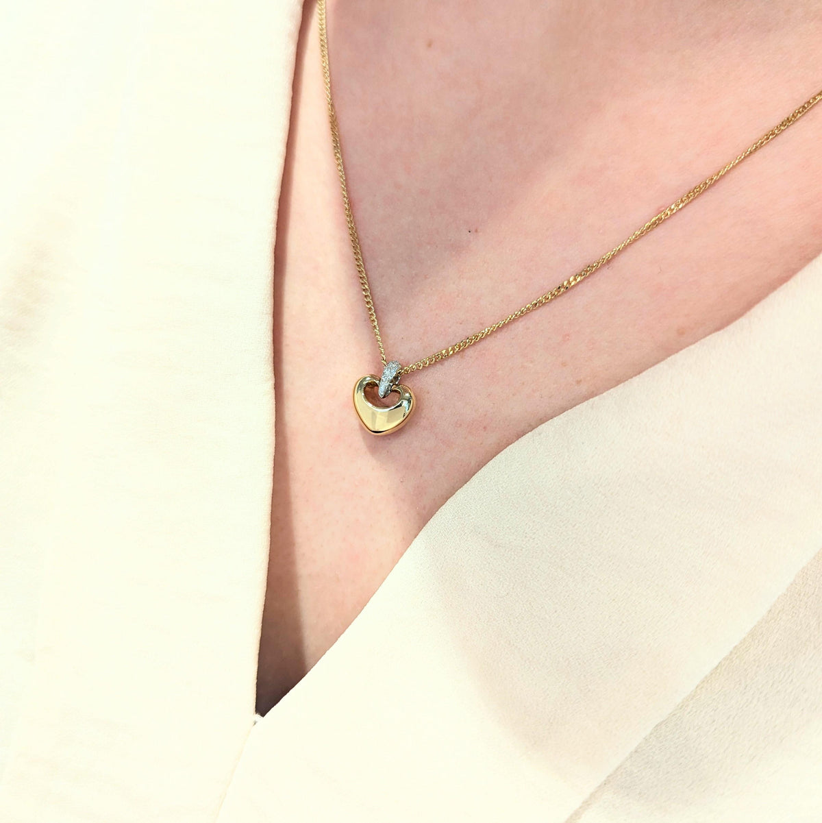 Collier coeur en or jaune et diamants