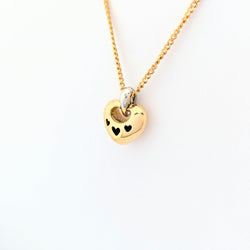 Collier coeur en or jaune et diamants