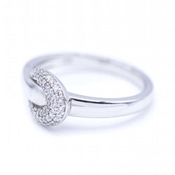 Bague Jonc Boucle en or blanc avec Diamants.