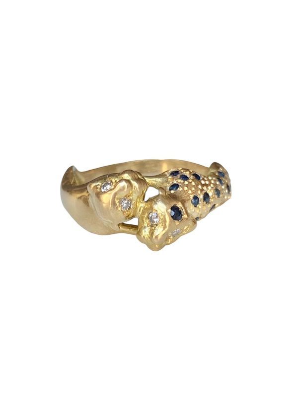 Bague en or jaune 18k représentant l'union de deux panthères