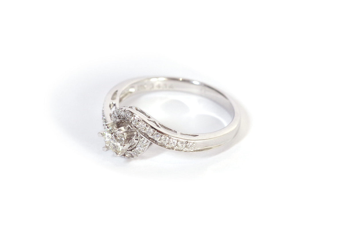 Bague tourbillon diamants en or