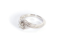 Bague tourbillon diamants en or