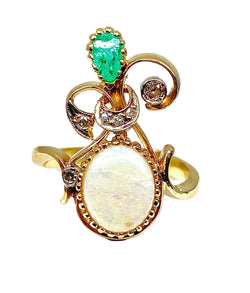 Bague en or jaune et or blanc 18 carats en opale, émeraude et diamants