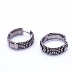 Boucles d'oreilles DAMIANI en or noir. D'occasion