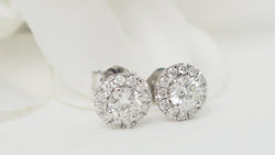 Boucles d'oreilles marguerite en or blanc et diamants