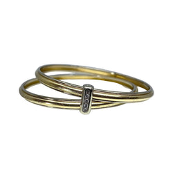 Bracelet double joncs or 18 carats, diamants, Yves Saint Laurent