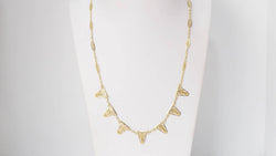 Collier draperie en or filigrané