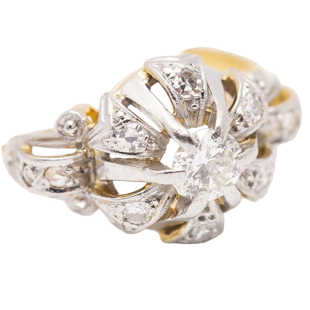 Bague en or jaune, platine et diamants.