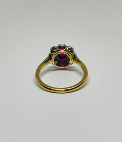 Bague marguerite art déco rubis et diamants
