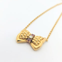 Collier Fred Nœud or jaune diamant et rubis