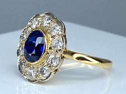 Bague marguerite en or 18 carats en saphir et diamants