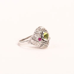 Bague Dôme Art Déco péridot rubis diamants