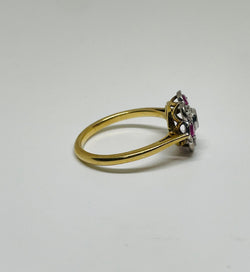 Bague marguerite art déco rubis et diamants