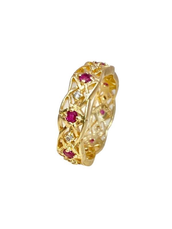 Anneau d'Eternité GIVENCHY, en or 18k, rubis et diamants.