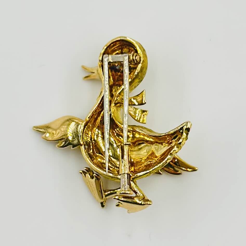 Broche BOUCHERON "Canard marchant"  en or jaune