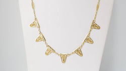 Collier draperie en or filigrané