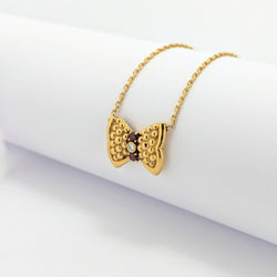 Collier Fred Nœud or jaune diamant et rubis