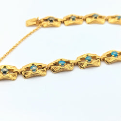Bracelet en or jaune et turquoises