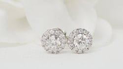 Boucles d'oreilles marguerite en or blanc et diamants