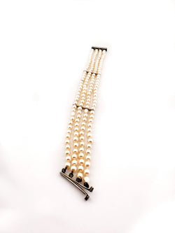 Bracelet Souple 4 rangs de perles blanches or blanc et diamants