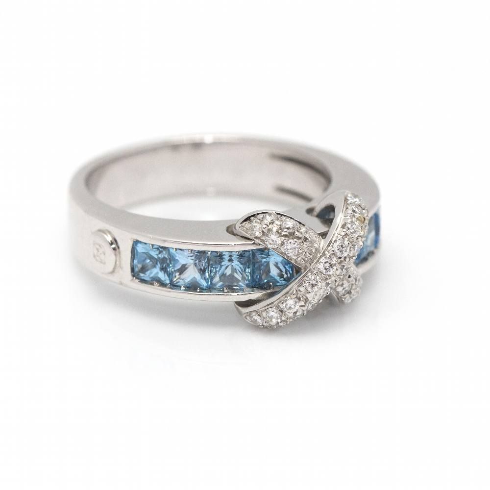Bague en or blanc, topazes et diamants d'occasion