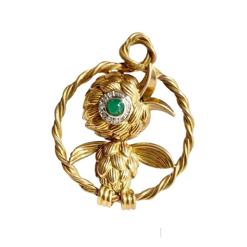 Broche en or jaune 18k et platine représentant un oiseau