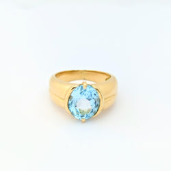 Bague en or jaune et topaze