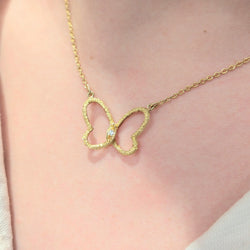 Collier papillon or jaune et diamant