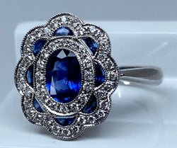 Bague marguerite en or 18 carats en saphirs et diamants