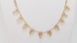 Collier draperie ancien en or jaune
