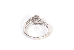 Bague tourbillon diamants en or