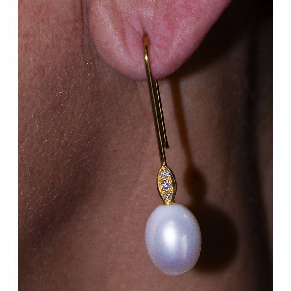 Boucles d'oreilles ovales en perles et diamants