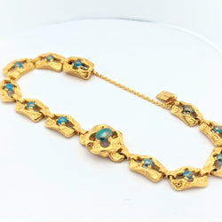 Bracelet en or jaune et turquoises