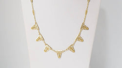 Collier draperie en or filigrané