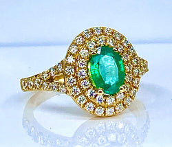 Bague en or jaune 18 carats ornée d’une émeraude et diamants