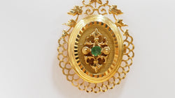 Pendentif porte photo en or jaune et émeraude