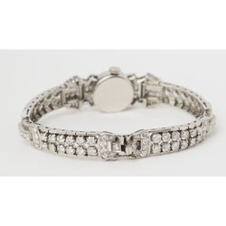 Montre ancienne en or platine et diamants
