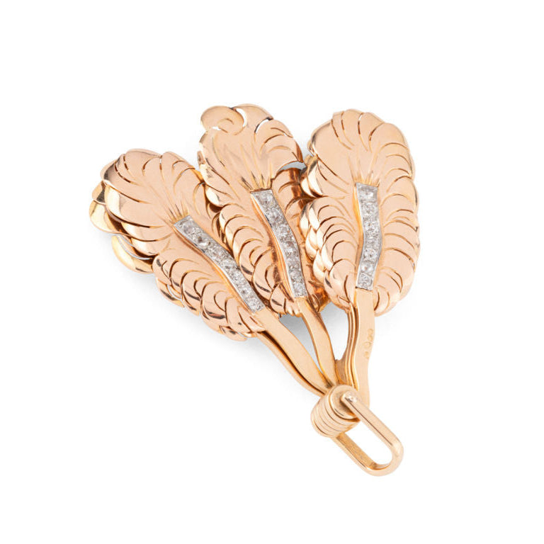 Broche Clip MELLERIO "Eventail" en or jaune, platine et diamants