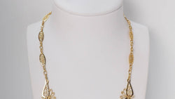 Collier draperie ancien en or jaune