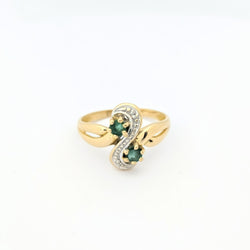 Bague or jaune diamants et émeraudes