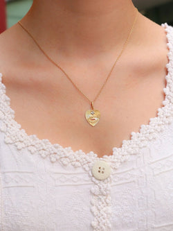 Médaille amour AUGIS coeur strié Plus qu'hier moins que demain or jaune rubis - Castafiore