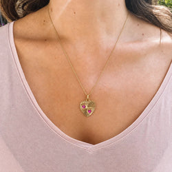 Médaille en or jaune et rubis - Castafiore