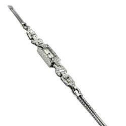 Montre Art-Déco en platine, or et diamants - Castafiore
