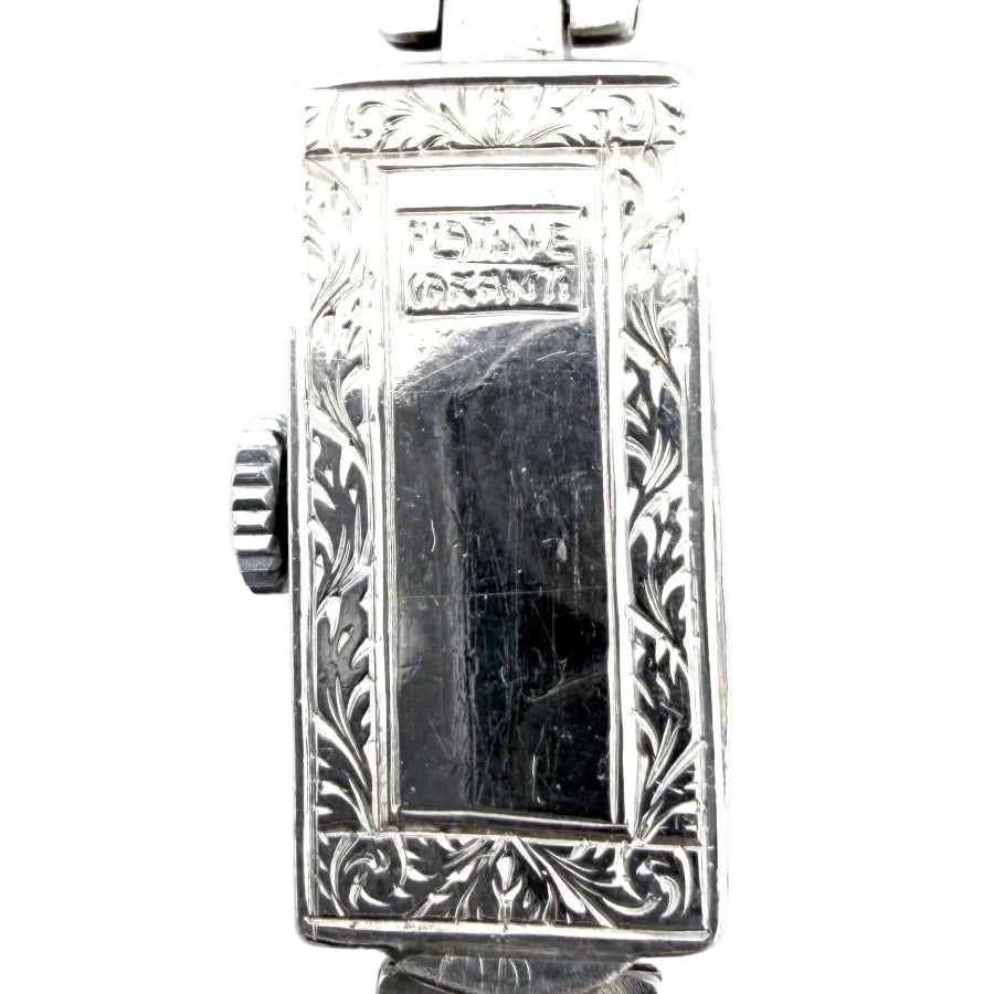 Montre Art-Déco en platine, or et diamants - Castafiore