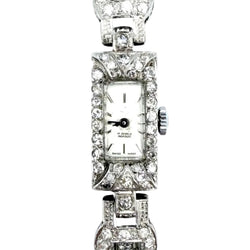 Montre Art-Déco en platine, or et diamants - Castafiore