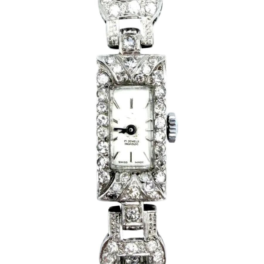 Montre Art-Déco en platine, or et diamants - Castafiore