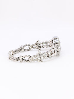 Montre Art Deco or blanc platine diamants - Castafiore