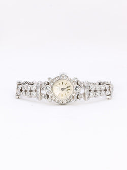 Montre Art Deco or blanc platine diamants - Castafiore
