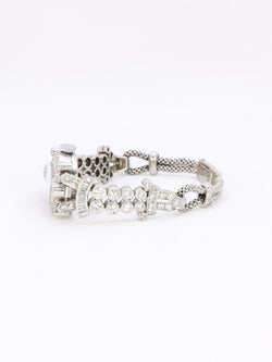 Montre Art Deco or blanc platine diamants - Castafiore