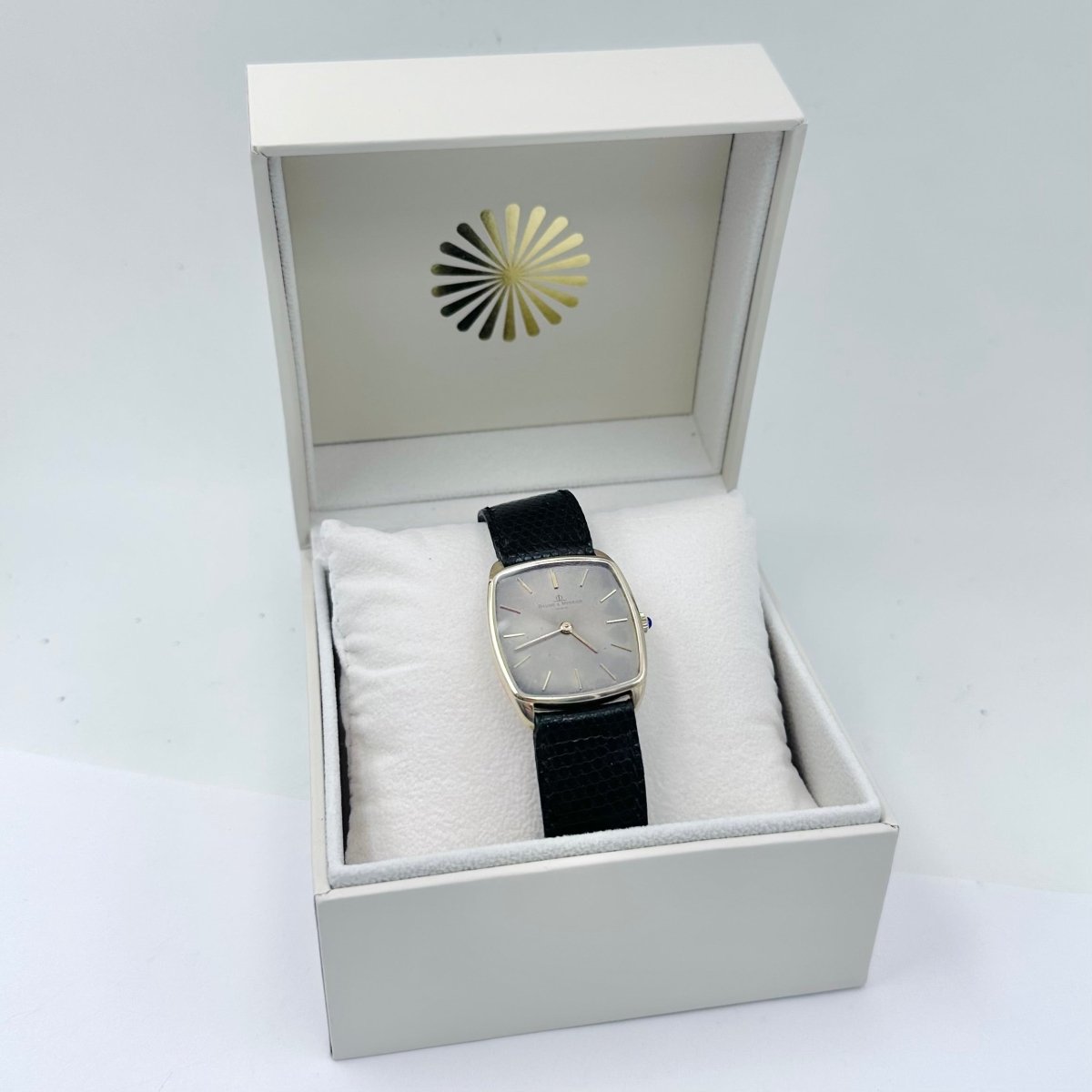 Montre BAUME & MERCIER en or jaune et cuir - Castafiore